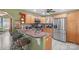 Charming kitchen with granite countertops, stainless steel appliances, and a cozy breakfast bar with seating at 1529 Indian Springs Nw Dr, Conover, NC 28613