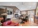 Inviting living room with hardwood floors, a fireplace, built-in shelving, and comfortable seating at 1529 Indian Springs Nw Dr, Conover, NC 28613