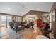 Spacious living room featuring a vaulted ceiling, hardwood floors, and an open layout to the kitchen at 1529 Indian Springs Nw Dr, Conover, NC 28613