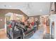 Spacious living room featuring hardwood floors, an open layout, and seamless flow to the kitchen and dining areas at 1529 Indian Springs Nw Dr, Conover, NC 28613
