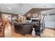 Comfortable living room with a fireplace, built-in shelving, hardwood floors, and an open floor plan at 1529 Indian Springs Nw Dr, Conover, NC 28613