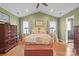 Spacious main bedroom suite features hardwood floors, ensuite bath, and ample closet space at 1529 Indian Springs Nw Dr, Conover, NC 28613