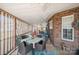 Relax on the patio with outdoor seating and a ceiling fan for a cool breeze at 1529 Indian Springs Nw Dr, Conover, NC 28613