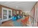 Relax on the covered porch with rocking chairs and ceiling fans for a cool breeze at 1529 Indian Springs Nw Dr, Conover, NC 28613
