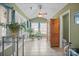Sunroom features tile floors, natural light, and access to the rest of the home at 1529 Indian Springs Nw Dr, Conover, NC 28613