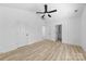 Spacious bedroom with wood-look flooring and ample natural light at 1611 Carlton Ave, Kannapolis, NC 28083