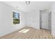 Bright bedroom with a window and a door at 1611 Carlton Ave, Kannapolis, NC 28083