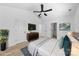 Spacious main bedroom with a large window, stylish furniture, and a soothing color palette at 1611 Carlton Ave, Kannapolis, NC 28083