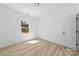 Bright bedroom with natural light and wood-look flooring at 1615 Carlton Ave, Kannapolis, NC 28083