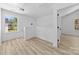 Bonus room with wood-look flooring and a large window offering natural light at 1615 Carlton Ave, Kannapolis, NC 28083