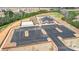 A birds-eye view reveals a community clubhouse, tennis courts, and ample parking, nestled within lush landscaping at 1770 Wardwell Dr # 338, Sherrills Ford, NC 28673