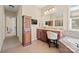 Bathroom featuring dual vanities with granite countertops, tiled floors and a soaking tub at 224 Alexandria Dr, Mooresville, NC 28115