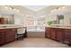 Bathroom featuring dual vanities with granite countertops, tiled floors and a soaking tub at 224 Alexandria Dr, Mooresville, NC 28115