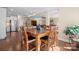 Open concept dining area adjacent to kitchen, hardwood floors and natural light at 224 Alexandria Dr, Mooresville, NC 28115