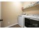Laundry Room showcasing a modern washer and dryer and shelf space at 224 Alexandria Dr, Mooresville, NC 28115