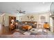 Cozy living room features a fireplace, hardwood floors, and comfortable seating area at 224 Alexandria Dr, Mooresville, NC 28115