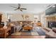 Inviting living room features a comfortable sectional sofa, fireplace, and stylish decor at 224 Alexandria Dr, Mooresville, NC 28115