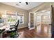 Comfortable office with hardwood floors, bright windows, and access to other areas at 224 Alexandria Dr, Mooresville, NC 28115