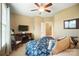 Well-lit bedroom featuring a ceiling fan, and doorway to the rest of the house at 226 Hermance Ln, Mooresville, NC 28117