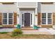 This home features updated trim, flower boxes, and a lovely, covered front porch at 230 Pond View Ln, Fort Mill, SC 29715