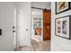 Inviting foyer with wood floors, decorative sliding barn door, and neutral paint at 230 Pond View Ln, Fort Mill, SC 29715