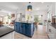 Open concept, modern kitchen flows to living room and boasts stainless appliances, & large island at 230 Pond View Ln, Fort Mill, SC 29715