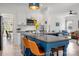 Open concept kitchen flows into living room with stainless appliances and kitchen island at 230 Pond View Ln, Fort Mill, SC 29715