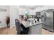 Well-lit kitchen with white cabinets, granite countertops, and a stainless steel refrigerator at 3222 Maple Ridge Dr, Gastonia, NC 28052