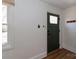 Bright entryway with a window and a stylish front door, offering a warm welcome at 324 East End S Ave, Statesville, NC 28677