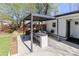 Stylish pergola with a built-in bar and seating area, creating an inviting outdoor living space at 324 East End S Ave, Statesville, NC 28677