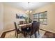 Elegant dining room with stylish chandelier, wooden furniture, and natural light creates an inviting atmosphere for meals at 352 Nantucket Way, Rock Hill, SC 29732