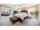 Spacious main bedroom featuring neutral colors and cozy sitting area bathed in natural light at 352 Nantucket Way, Rock Hill, SC 29732