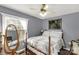 Cozy bedroom features a comfortable bed, natural light, and tasteful decor at 363 Arrowood Ave, Lancaster, SC 29720