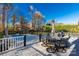 An outdoor deck area is furnished with a dining table and chairs, perfect for relaxation and entertainment at 363 Arrowood Ave, Lancaster, SC 29720