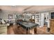 Spacious game room featuring pool table, bar, and comfortable seating at 363 Arrowood Ave, Lancaster, SC 29720