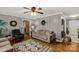 Cozy living room showcasing hardwood floors, neutral walls, and comfortable seating at 363 Arrowood Ave, Lancaster, SC 29720