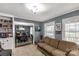 Comfortable living room with a large couch and views into the dining area at 363 Arrowood Ave, Lancaster, SC 29720