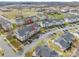 Aerial view of community featuring multiple buildings and ample parking spaces at 3960 Town Center Rd, Harrisburg, NC 28075