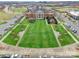 Aerial view featuring a large green space, Harrisburg Town Hall, and parking at 3960 Town Center Rd, Harrisburg, NC 28075