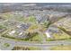 Aerial view showcasing community, commercial buildings, and a busy road network at 3960 Town Center Rd, Harrisburg, NC 28075