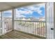 Balcony view showcasing the community with white railings and ample natural light at 3960 Town Center Rd, Harrisburg, NC 28075