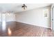 Bright living room with hardwood floors and stylish lighting fixtures at 3960 Town Center Rd, Harrisburg, NC 28075