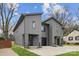 Modern townhomes showcasing sleek exteriors, well-manicured lawns and inviting entrances, blending contemporary design and comfort at 431 Norris Ave, Charlotte, NC 28206