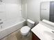 Bathroom featuring a tub-shower combination, toilet, and single sink vanity with mirror at 5006 Brodie Ln, Fort Mill, SC 29707