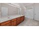 Spacious bathroom with double vanity, large mirror, and walk-in shower at 532 Knighton Hill Rd, Rock Hill, SC 29732