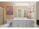 Comfortable bathroom with a shower, toilet, sink, and a large mirror at 5405 Berrywood Ln, Monroe, NC 28110