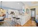 Well-lit kitchen with granite countertops and bar seating at 5405 Berrywood Ln, Monroe, NC 28110