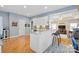 Open kitchen with granite counters, stainless steel appliances, and hardwood floors at 5405 Berrywood Ln, Monroe, NC 28110