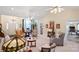 Bright living room featuring high ceilings, ceiling fans, neutral carpet and furnishings at 5405 Berrywood Ln, Monroe, NC 28110