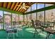 Bright sunroom with ceiling fan and views of the backyard at 5405 Berrywood Ln, Monroe, NC 28110